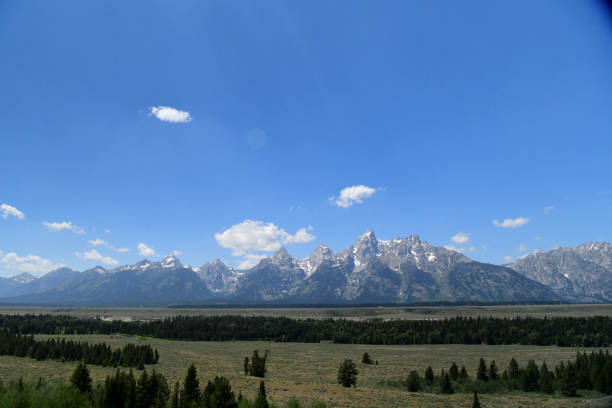 Grand Teton National Park, Wyoming, USA July 18, 2023: The Grand Teton Mountain Range dominates the landscape in Grand Teton National Park. The mountain range evokes feelings of beauty, majesty, grandeur and power.