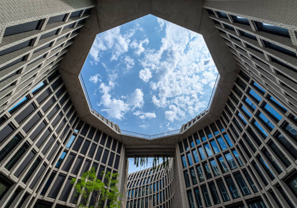 istock Low angle view of modern building against sky 1567687008