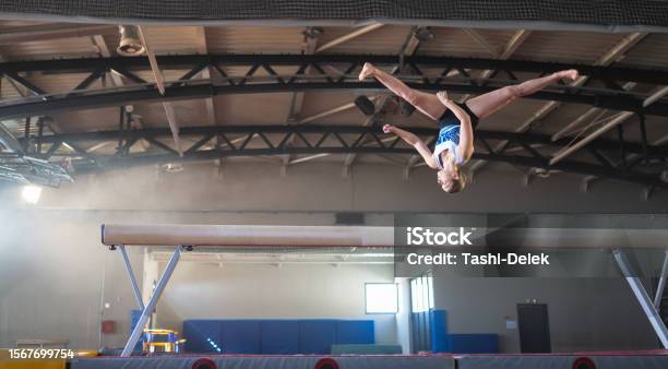 Female Gymnast On Balance Beam Stock Photo - Download Image Now - Accuracy, Expertise, Handstand
