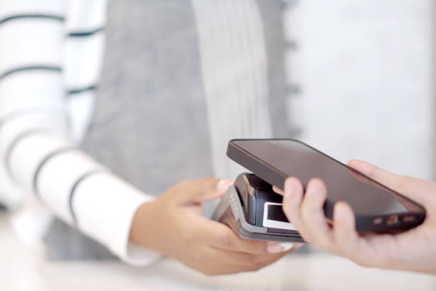 istock Customer make a payment on smartphone and credit card. 1567707238