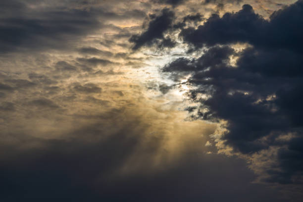 Sky sights, dark ominous clouds at bright sunset, dramatic heaven