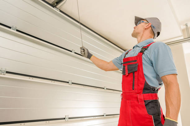istock Garage Gates Maintenance Performed by Caucasian Technician 1567733025