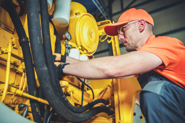 istock Industrial Heavy Equipment Mechanic at Work 1567746419