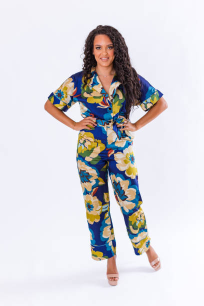 istock Young woman in bright colored outfit 1567821058
