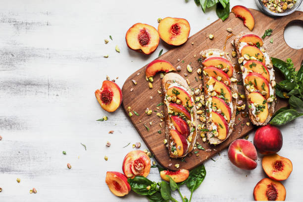 Fresh Peach and Pistachio Toast stock photo