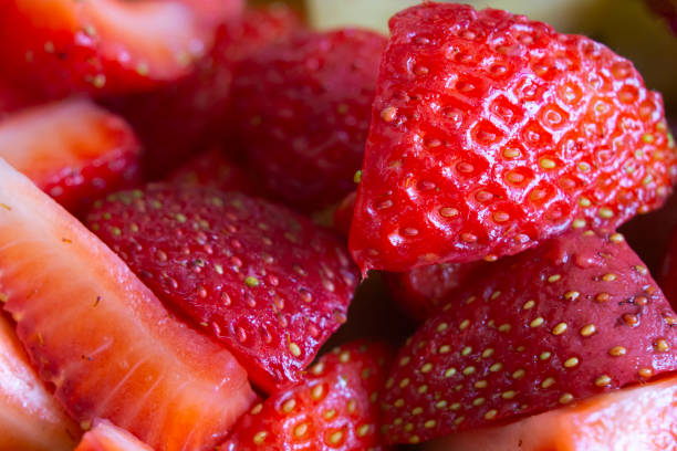 istock Macro shot of sliced strawberries 1567833822