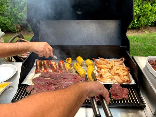istock Meat and Seafood on the Grill 1567835429