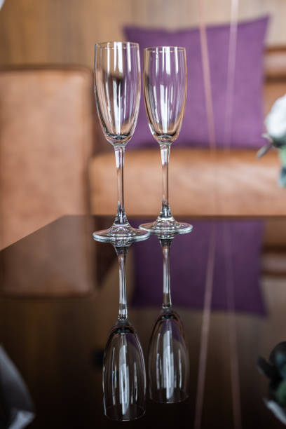 istock Champagne glasses on the table 1567835971