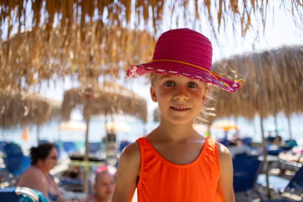 Portrait of child in panama on the beach