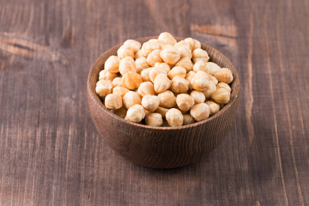 istock Organic hazelnuts in a bowl. 1567905538