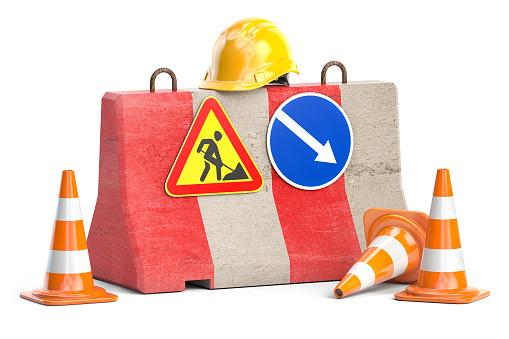 Under construction. Road barrier with trafic signs, cones and hard hat. 3d illustration.