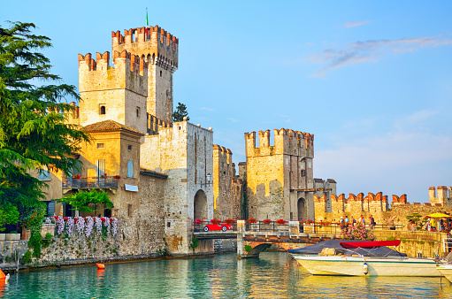 Famous Scaligero Castle (Castello Scaligero) is a 13th century fortress and gate to the historical center of Sirmione town in Lombardy, Italy. It is one of the most imposing medieval fortresses in Europe