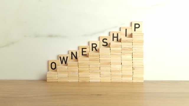 Word ownership made from wooden blocks