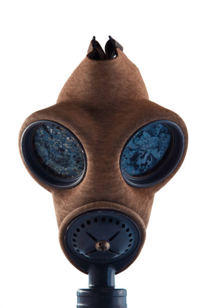 Old-fashioned military gas mask on white background