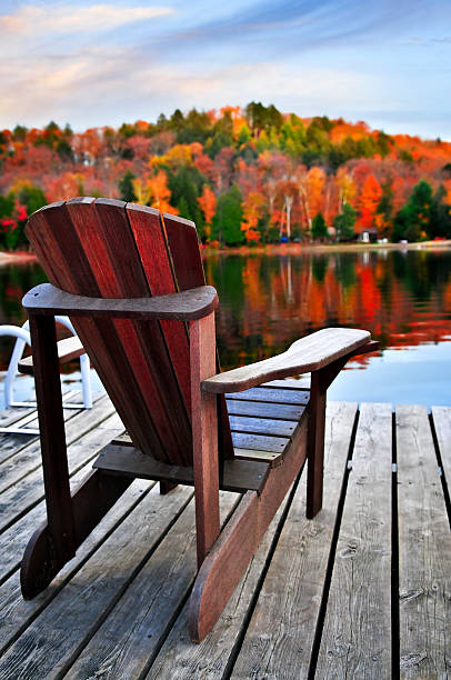 istock Wooden dock on autumn lake 156796206