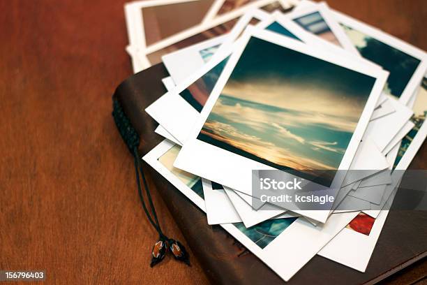 Polaroid Pictures Of Sunset On Leather Journal Stock Photo - Download Image Now - Instant Print Transfer, Instant Camera, Photographic Print