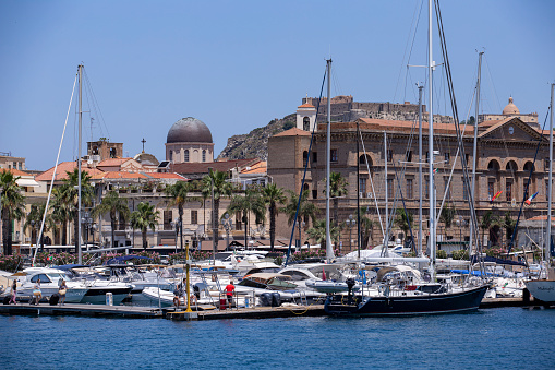 Partial view of the port of Milazzo with the Town Hall in the background