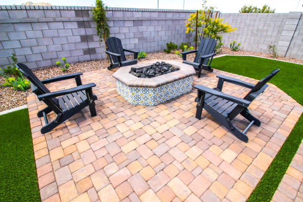 istock Rear Pavers Patio With Fire Pit And Four Arm Chairs 1568033249
