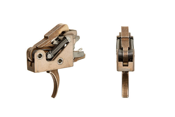 istock Shock trigger for gun isolate on white background. Gun trigger. Repair spare part. 1568042740