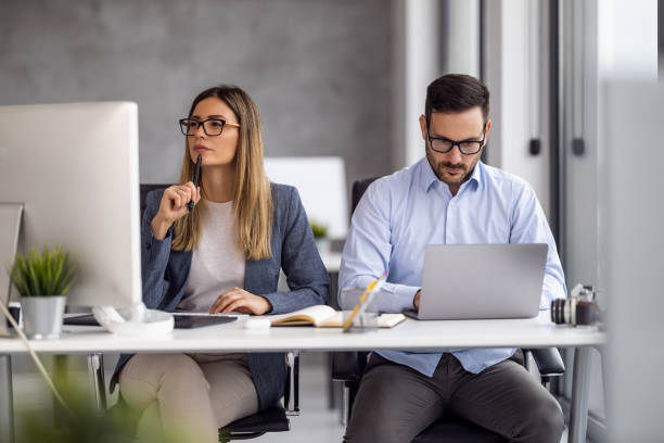 istock Web designers working at office and planning new website 1568047606
