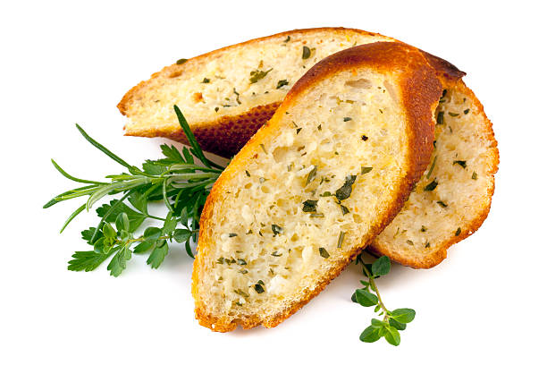 garlic bread with herbs isolated - kruton stok fotoğraflar ve resimler