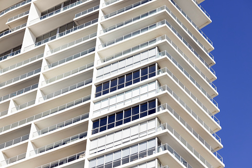 Closeup modern apartment building,  Broadbeach Gold Coast Queensland Australia, background with copy space, full frame horizontal composition