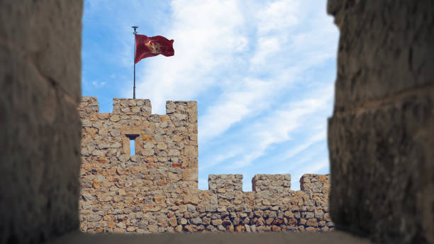 istock Roman military fort tower with flag 1568123762