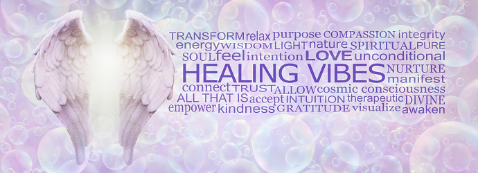 pair of Angel Wings beside a word cloud relevant to HEALING VIBES on a lilac bubble filled background