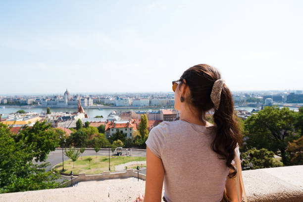 istock Beautiful female model watching over Budapest, Hungary 1568158040