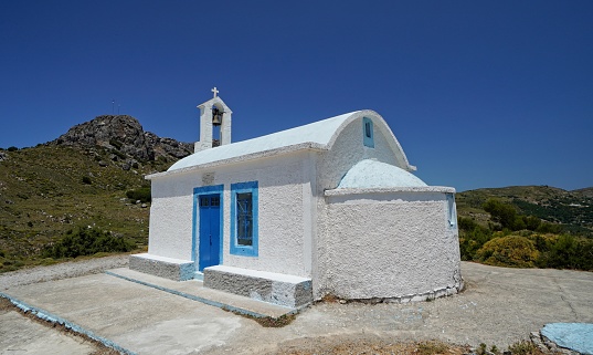 White and blue church in the mountains near Sougia, Crete, Greece