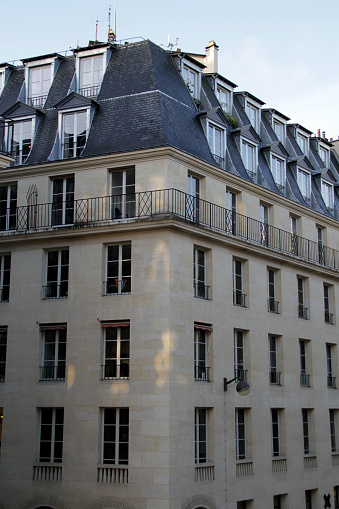 Low angle view of a traditional apartment building in Paris