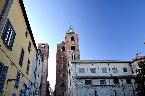 Evening shot of two dynasty towers in Albenga - Liguria, Italy.