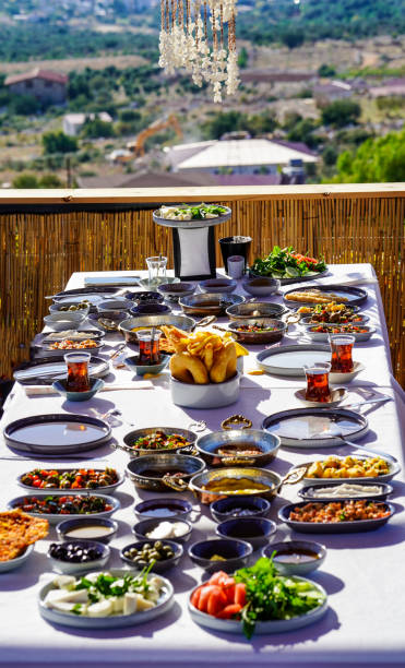 istock Turkish breakfast on the table in the morning and with a nice view in reed balcony 1568189145