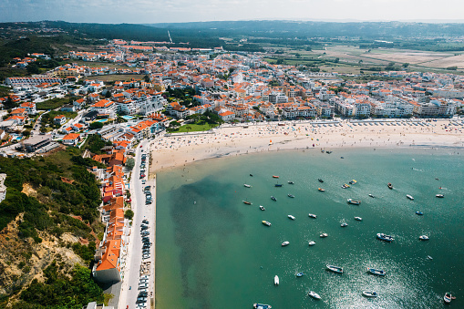 Aerial drone view of landmarks at Sao Martinho do Porto surrounding the iconic natural bay