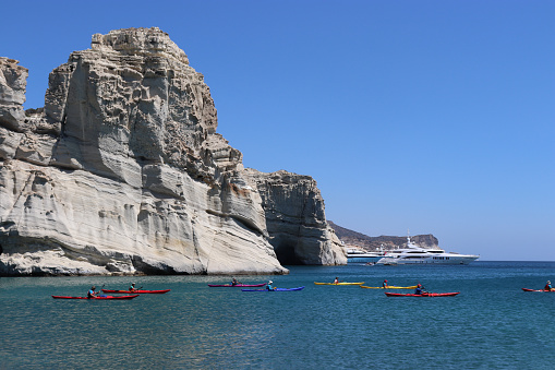 A group of kayakers near Kleftiko beach, Milos Island, Greece