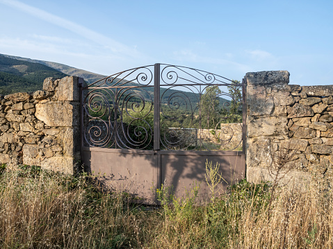 Old iron gate in the field