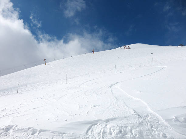 istock Ski runs covered by fresh powder snow 156823911
