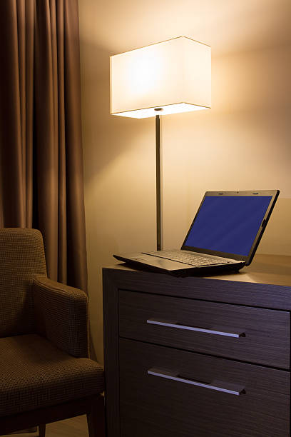 istock Laptop on desk in hotel room 156825261
