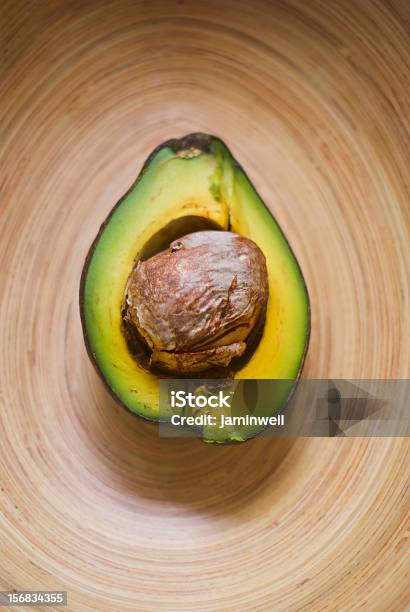 Food And Art Cut Pear Cross Section In Bamboo Bowl Stock Photo - Download Image Now