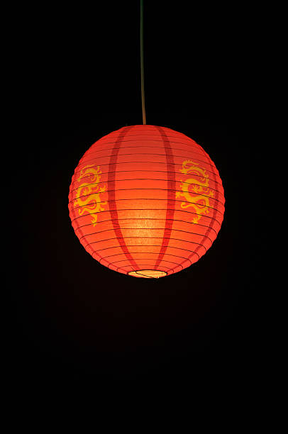 istock Hanging Chinese Lantern against a black background 156837638