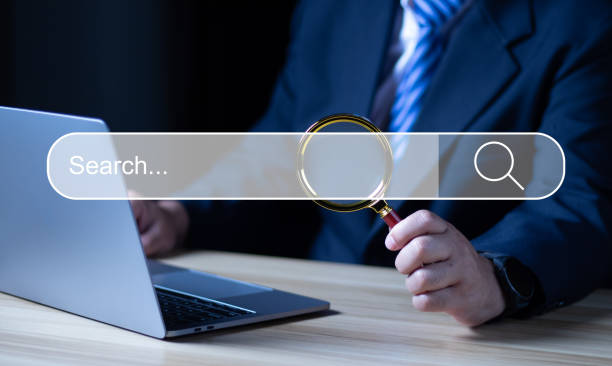 istock Digital Communication and Research - Businessman Using Laptop for Online Browsing 1568397868