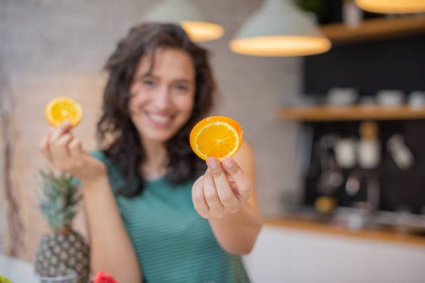 istock Woman eating a healthy breakfast 1568434898
