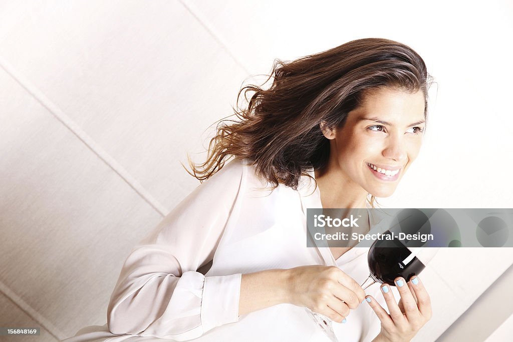 Drinking wine Portrait of a beautiful, latin Woman drinking red wine. Human Lips Stock Photo