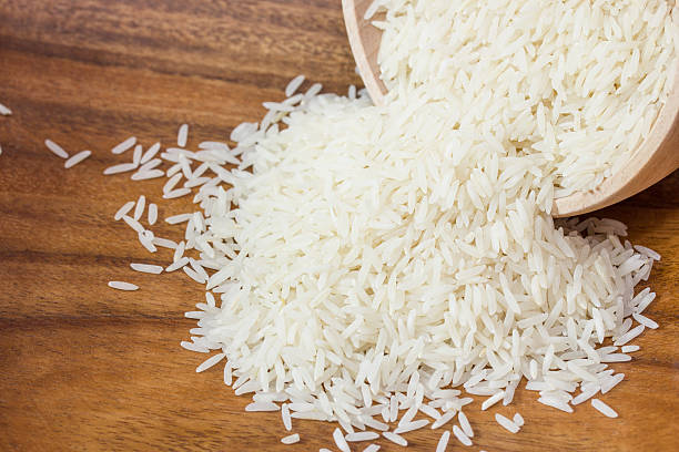 istock Basmati rice on wooden board 156849494