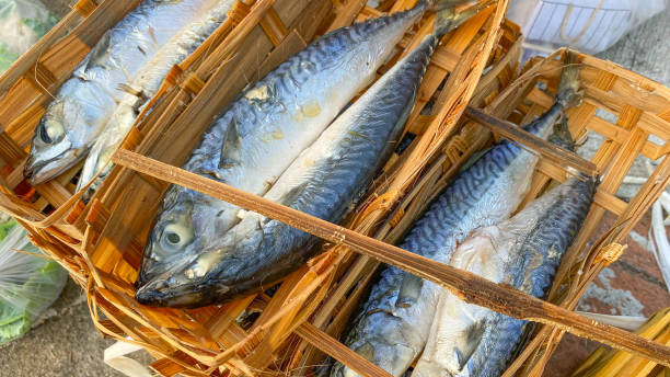 istock Pile of marinated little tuna mackarel pindang cob fish placed in a bamboo container 1568518459