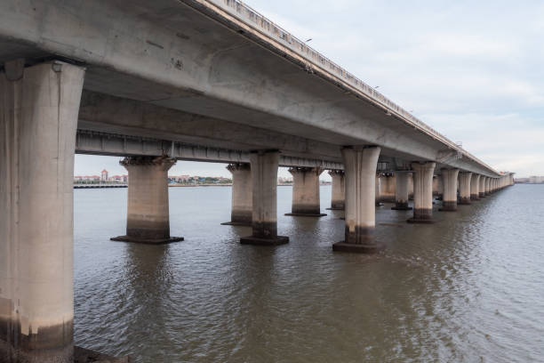 istock Cross-sea highway bridge piers 1568598959