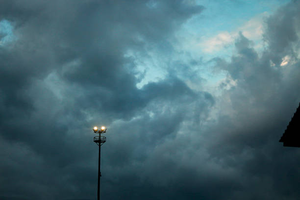 lampposts light up in the evening
