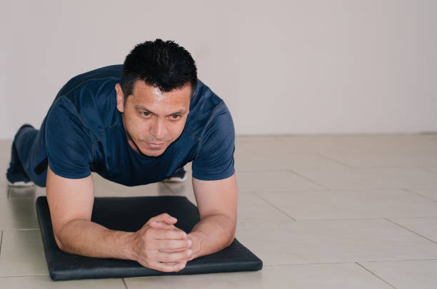 man doing push ups and copy space stock photo