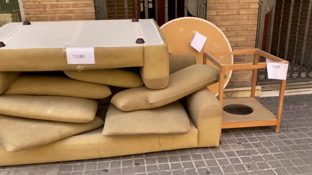 Dismantled sofa left in the street to be picked up