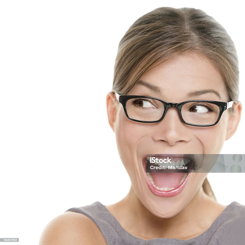 Excited woman looking Excited woman looking sideways screaming of joy. Closeup of happy mixed race Asian Chinese / Caucasian female business woman isolated on white background.Click for more: Women Stock Photo